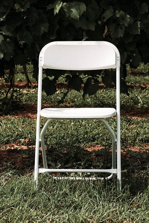 white poly folding chair