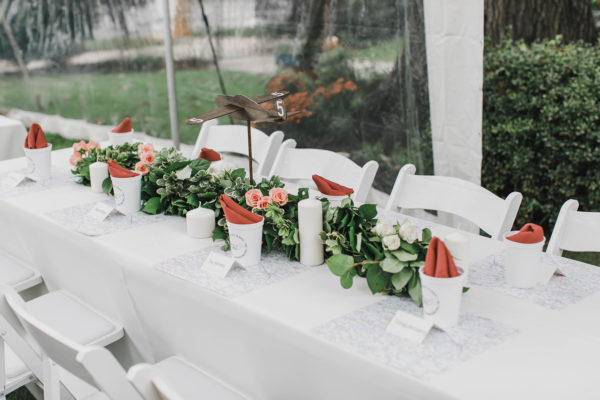 Image of Wedding Rental Head Table with White Padded Chairs