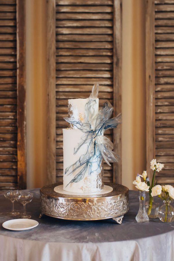 image of silver cake stand rental with cake