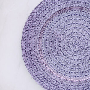 Image of purple beaded charger rental