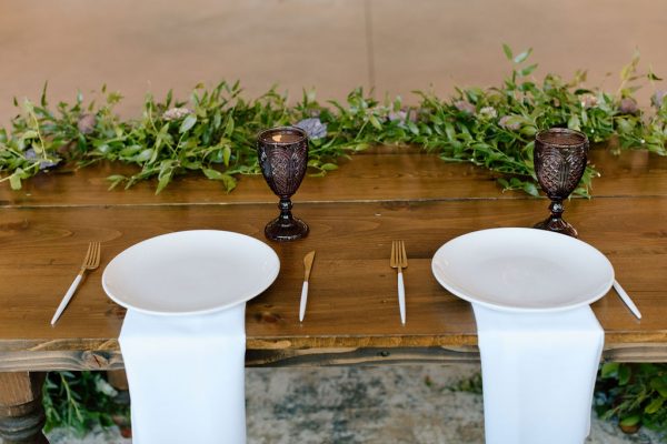 image of gold and white flatware rental on table