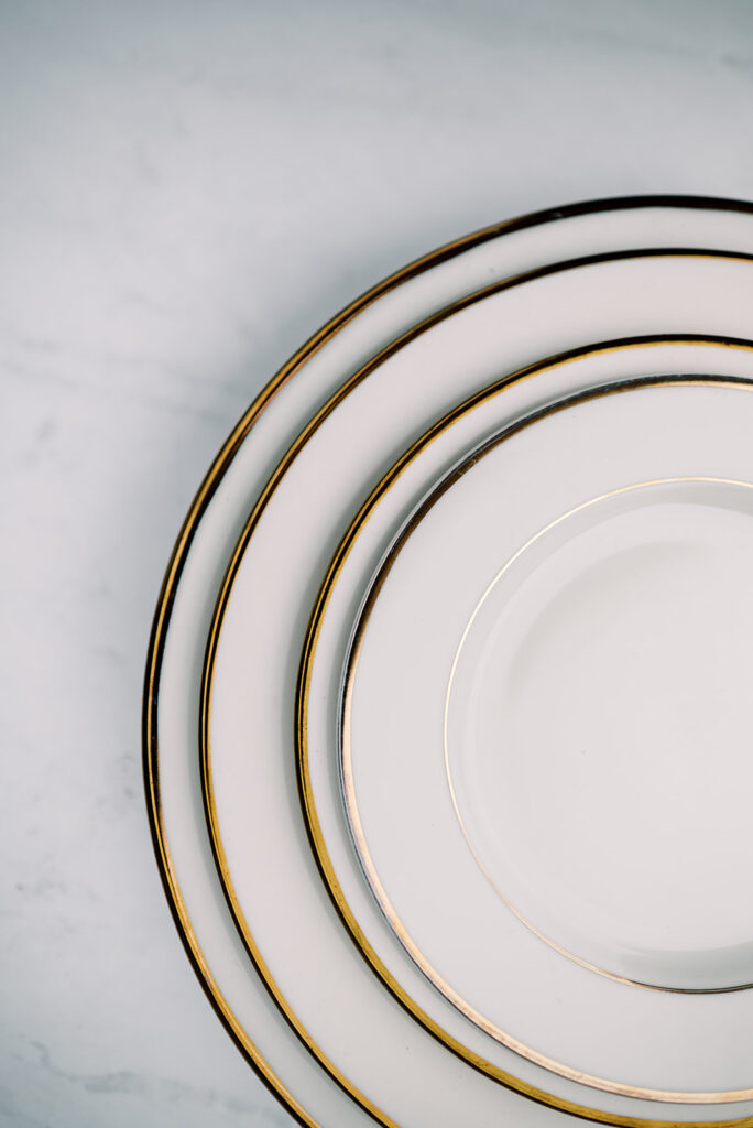 Gold Rim Dinnerware Rental Collection A to Z Event Rentals, LLC.