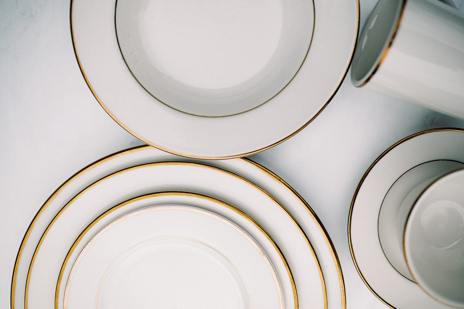 Gold Rim Dinnerware Rental Collection A to Z Event Rentals, LLC.