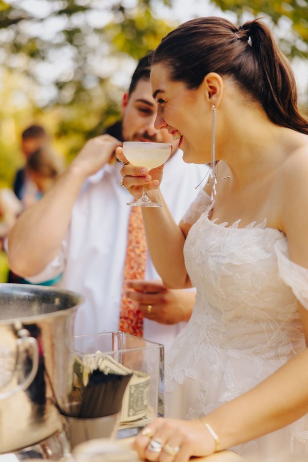 image of bride drinking from champagne coupe rental
