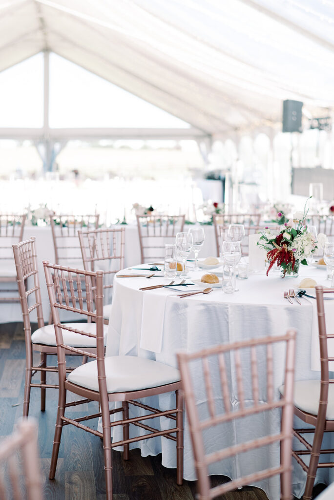 image of rose gold chiavari chairs and table arrangements