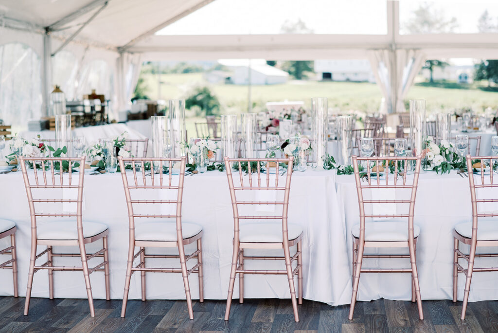 image of table arrangement with rose gold chiavari chairs