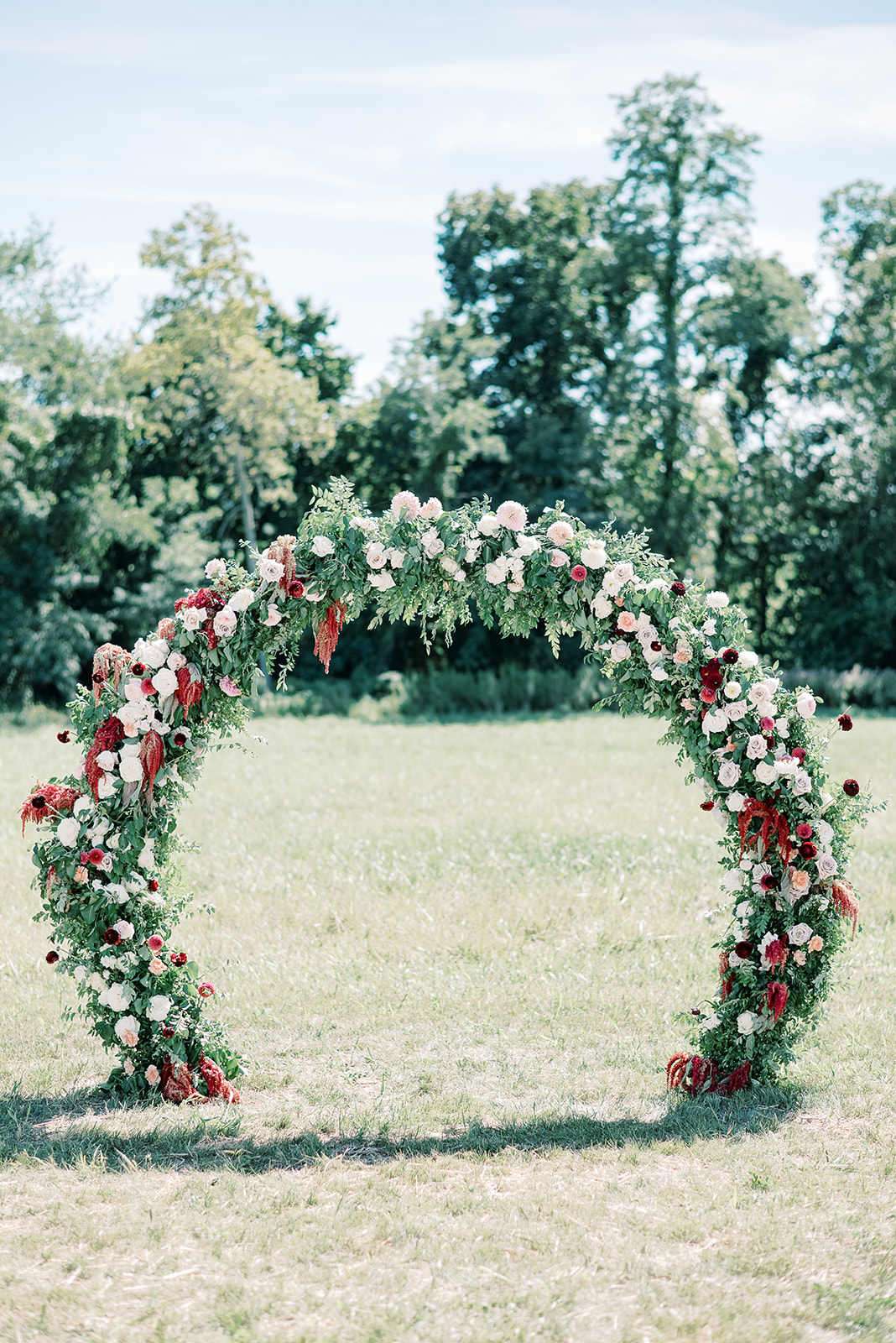 image of gold circle arch with florals