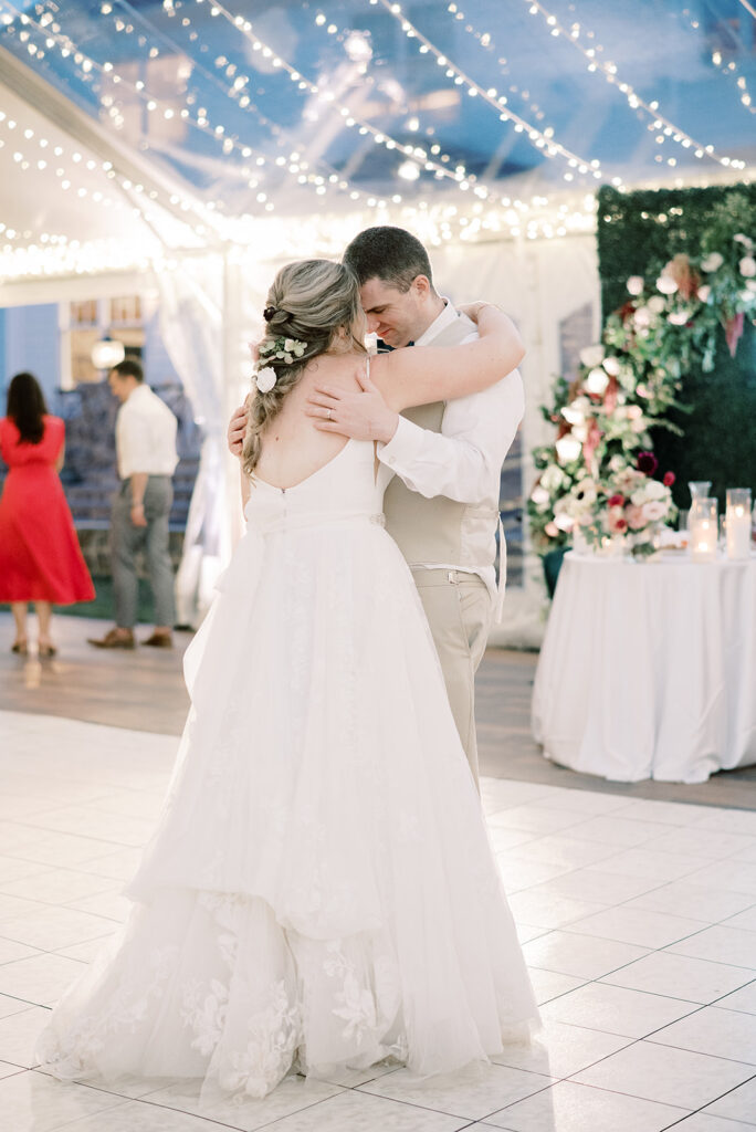 image of couple dancing on white marble dance floor rental