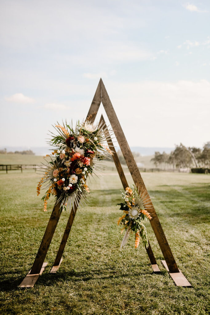 Image of triangle wedding arch