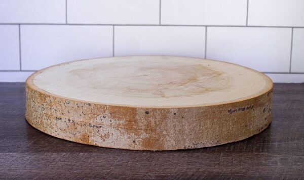 Image of wood slab cake stand rental