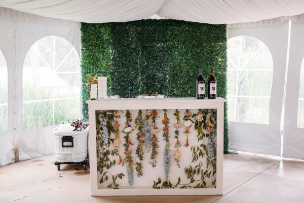 image of shadow box bar rental filled with flowers