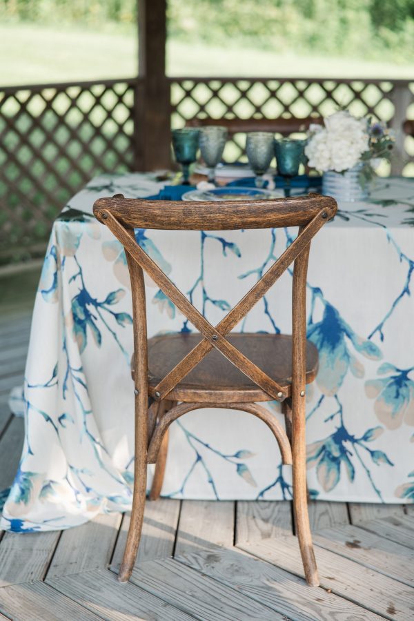 image of cross back chair rental at table