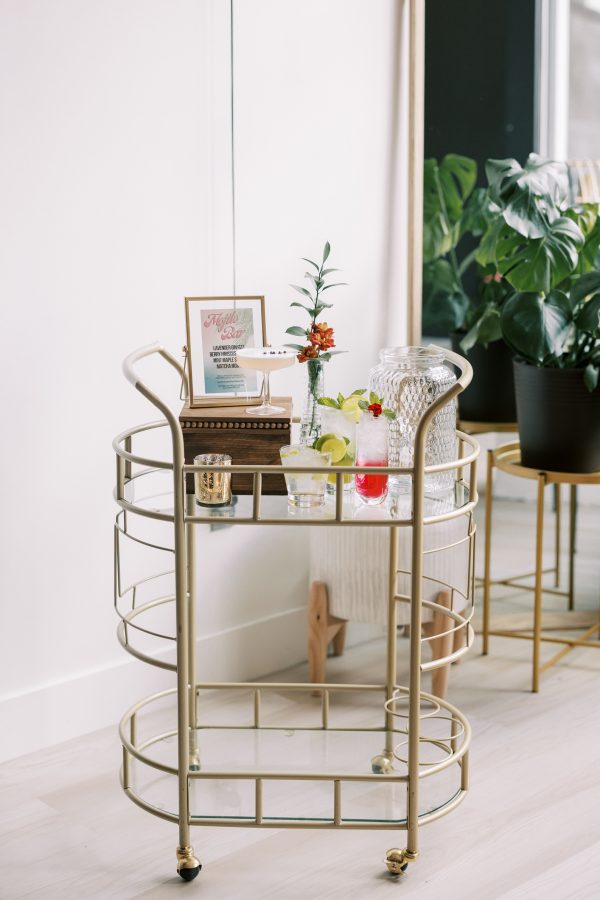 image of gold bar cart rental with drinks