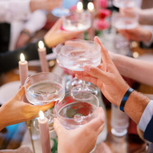 Image of fluted champagne coupe rentals used in a toast