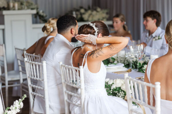 image of white chiavari chair rentals at wedding reception