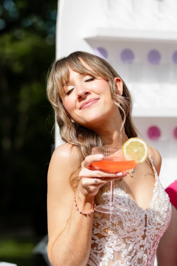image of fluted champagne coupe rental with a bride at a wedding