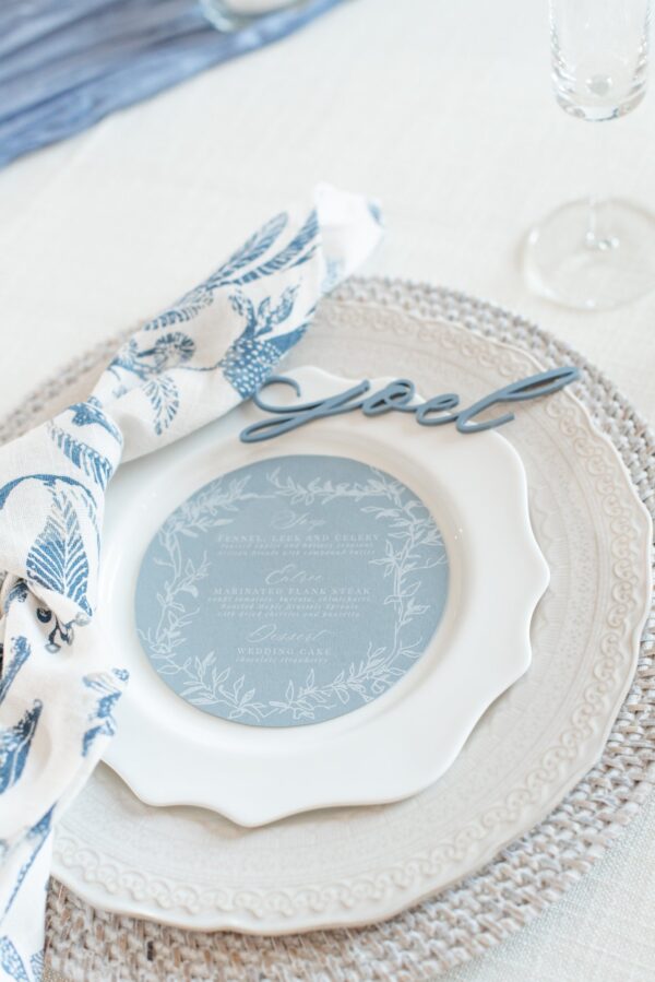 image of sutton rattan charger in place setting