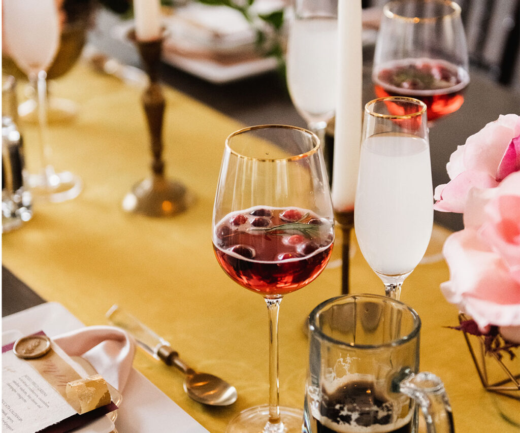 image of red wine glass with gold rim
