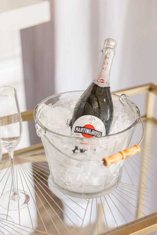 Close up image of champagne on reagan bar cart