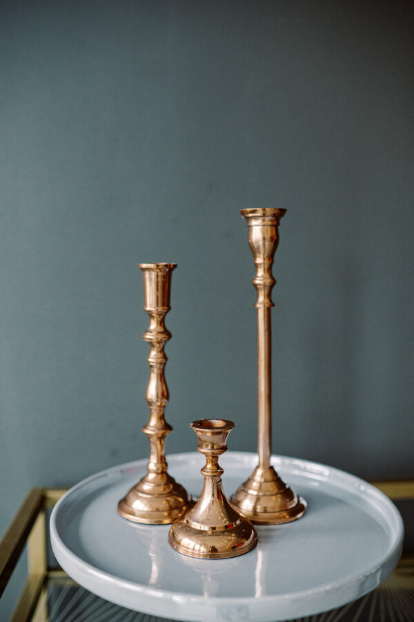 image of rose gold mismatched candlestick rentals