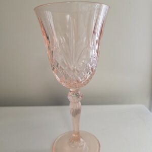 image of pink cut glass wine glass