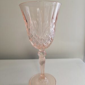 image of pink cut glass wine glass