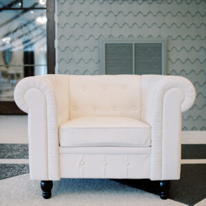 image of white leather arm chair rental