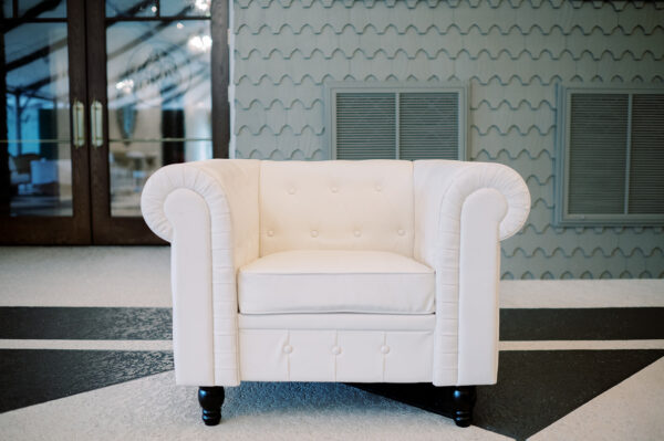 image of white leather arm chair rental