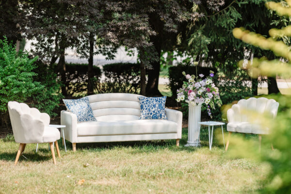 image of white wedding lounge rental set in field in PA