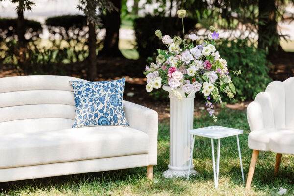 image of white wedding lounge rental set in field in PA