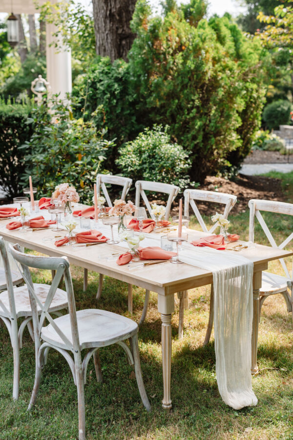 image of light wood farmhouse table rental