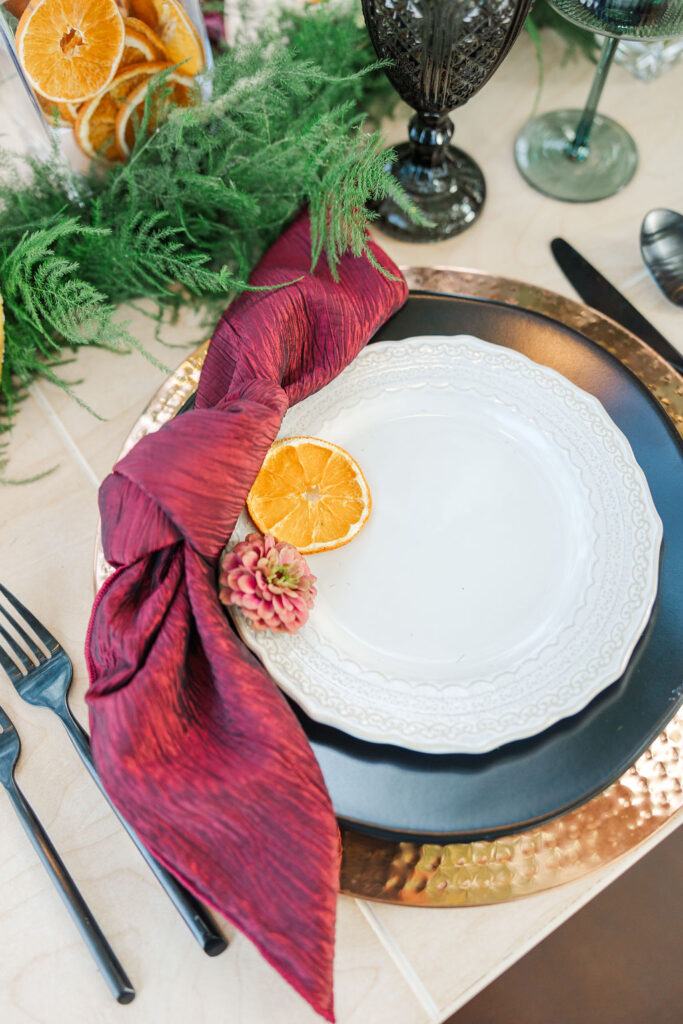 image of black and copper dinnerware rentals