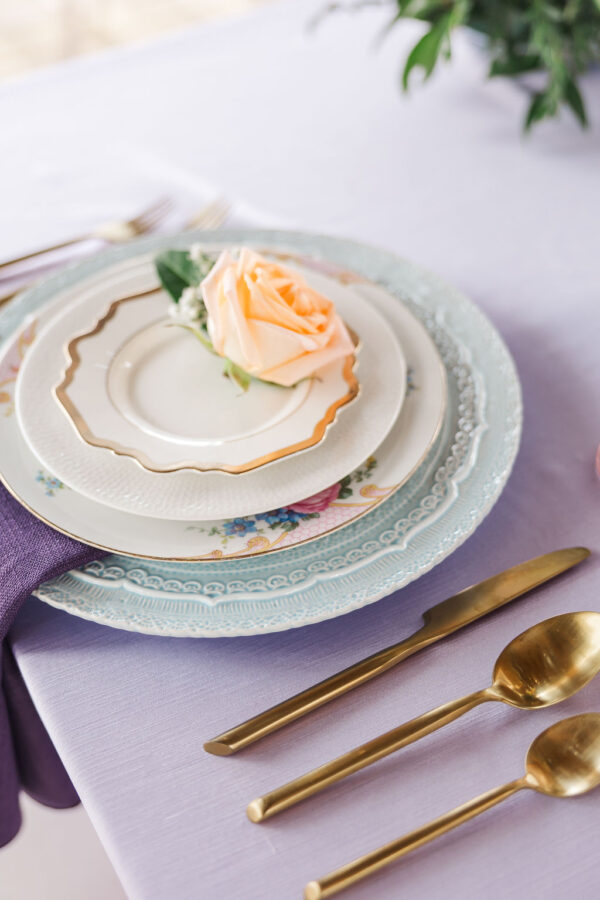 image of garden themed wedding dinnerware place setting rentals