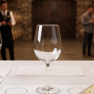 three clear wine tasting glasses