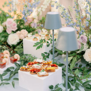 image of LED blue table lamp rentals on a wedding table
