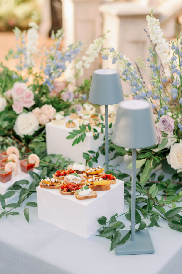 image of LED blue table lamp rentals on a wedding table