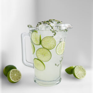 Glass Water Pitcher Rental with water and lime