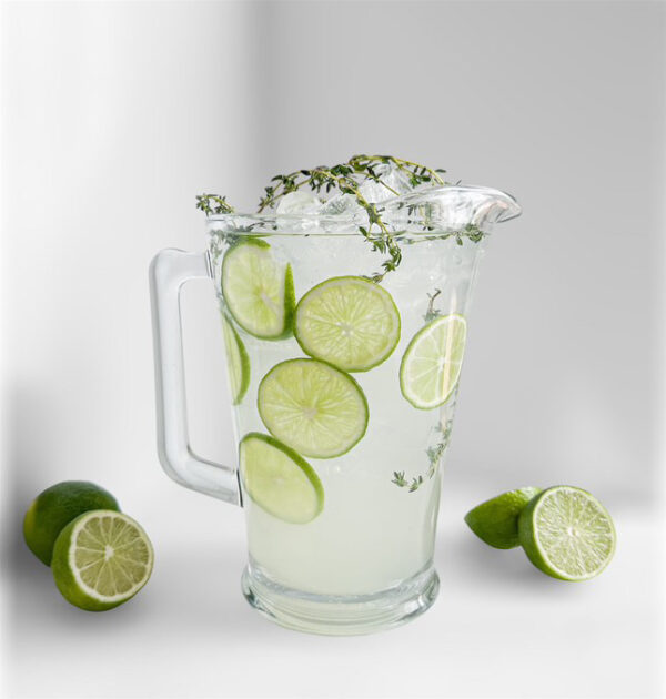 Glass Water Pitcher Rental with water and lime