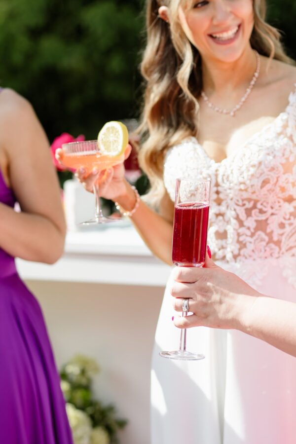 image of Klein champagne glass in bridesmaid's hand