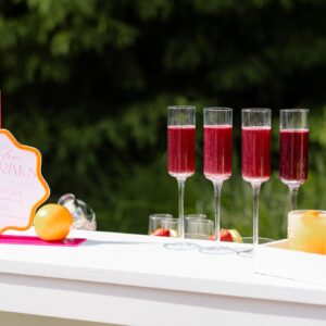image of klein champagne glasses staged on bar