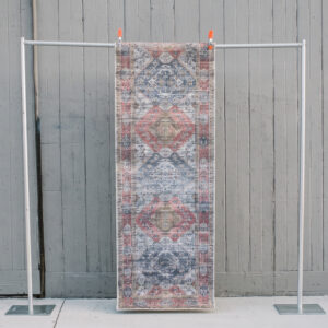image of Roman Rug Runner staged against a wooden barn wall