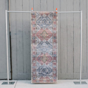 image of Roman Rug Runner staged against a wooden barn wall