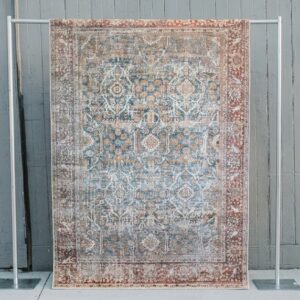 image of Reign rug rental displayed against a wooden wall