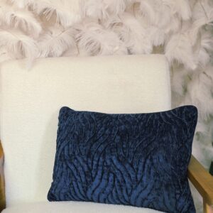 Navy velvet throw pillow with a wavy line pattern