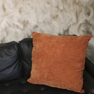 Velvet, burnt orange throw pillow.