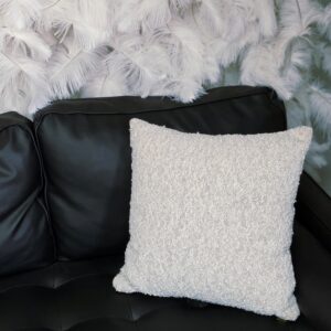 Pilled tan throw pillow