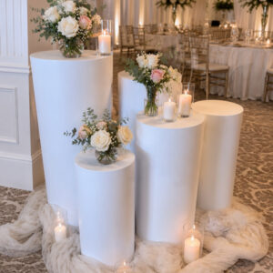 image of white floral display pillar rentals