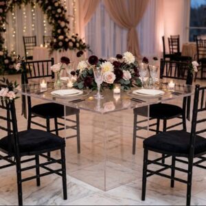 clear square table that can seat four people