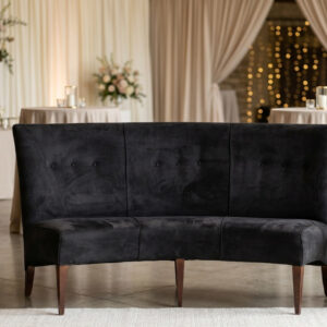 AI generated black velvet banquette styled in a cocktail hour setting.